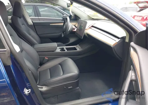 2023 Tesla Model Y Performance Dual Motor All-Wheel Drive z USA, uszkodzony, nr VIN 7SAYGDEF5PF700890